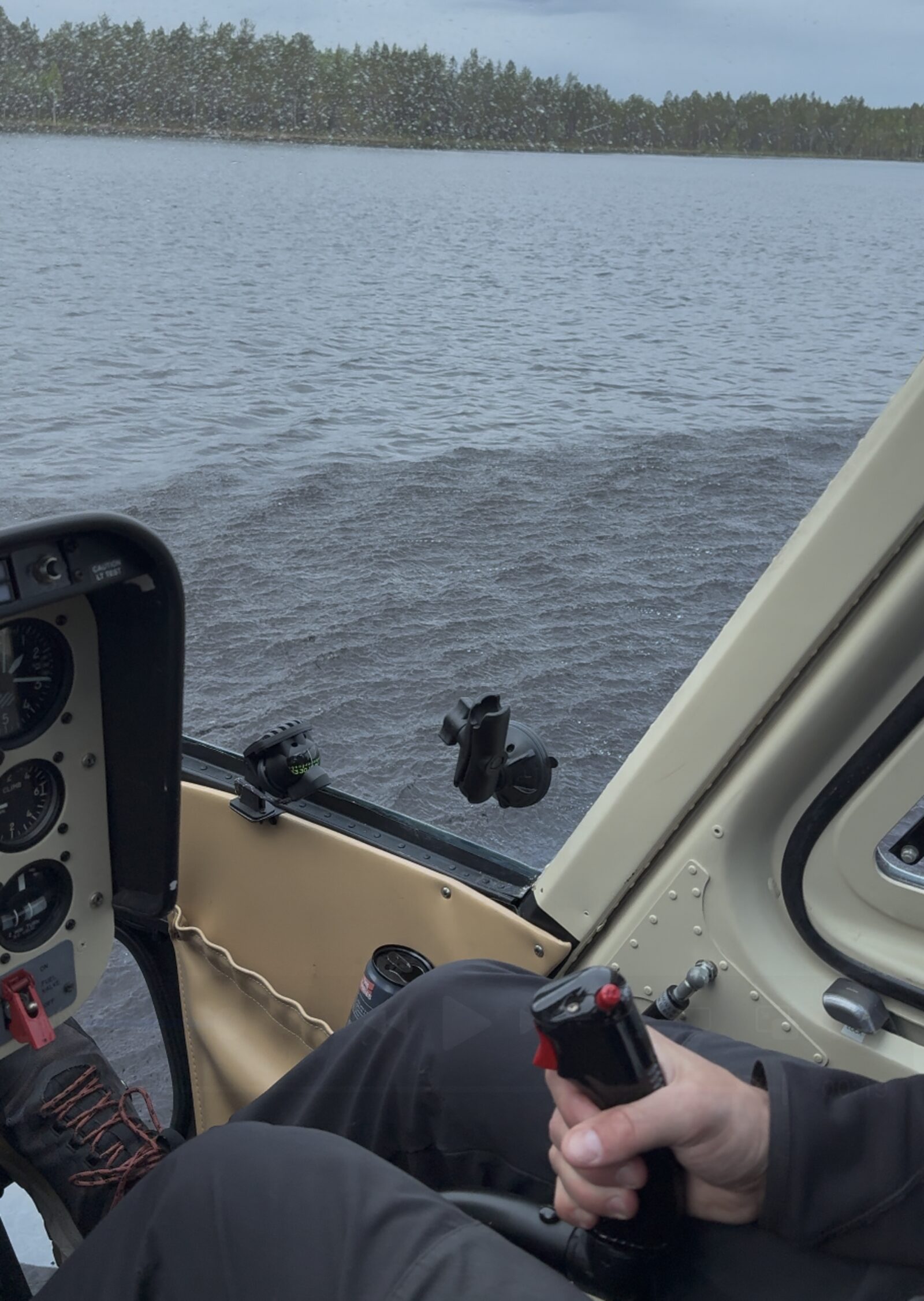 View from the cockpit over a lake during water sampling
