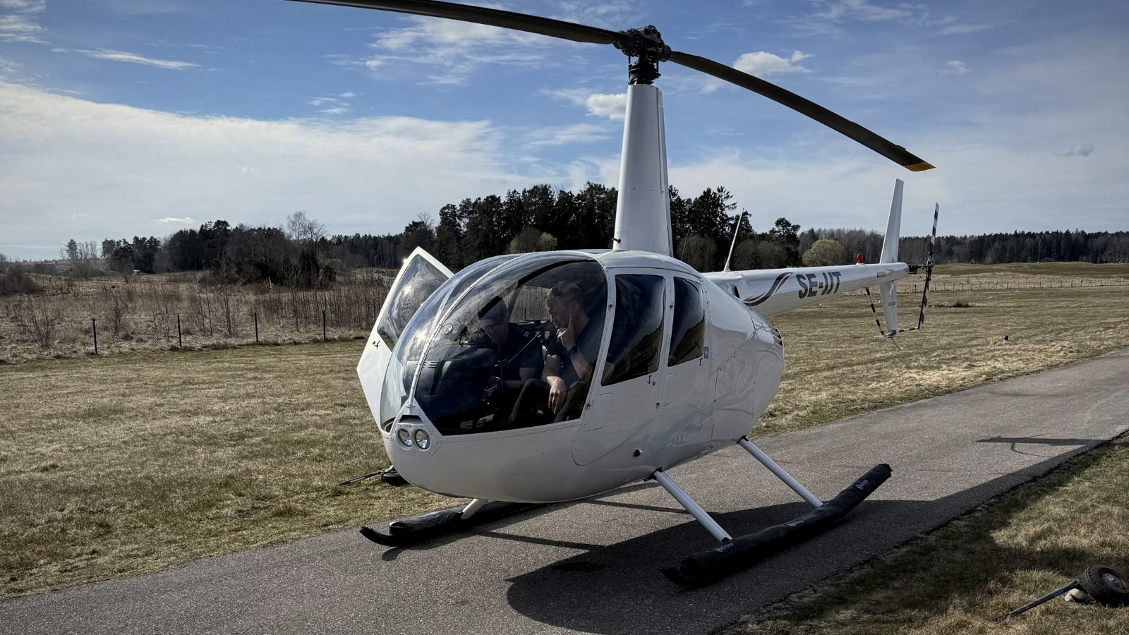 Robinson R44 SE-JJT at the Arlanda Helicopter flight school
