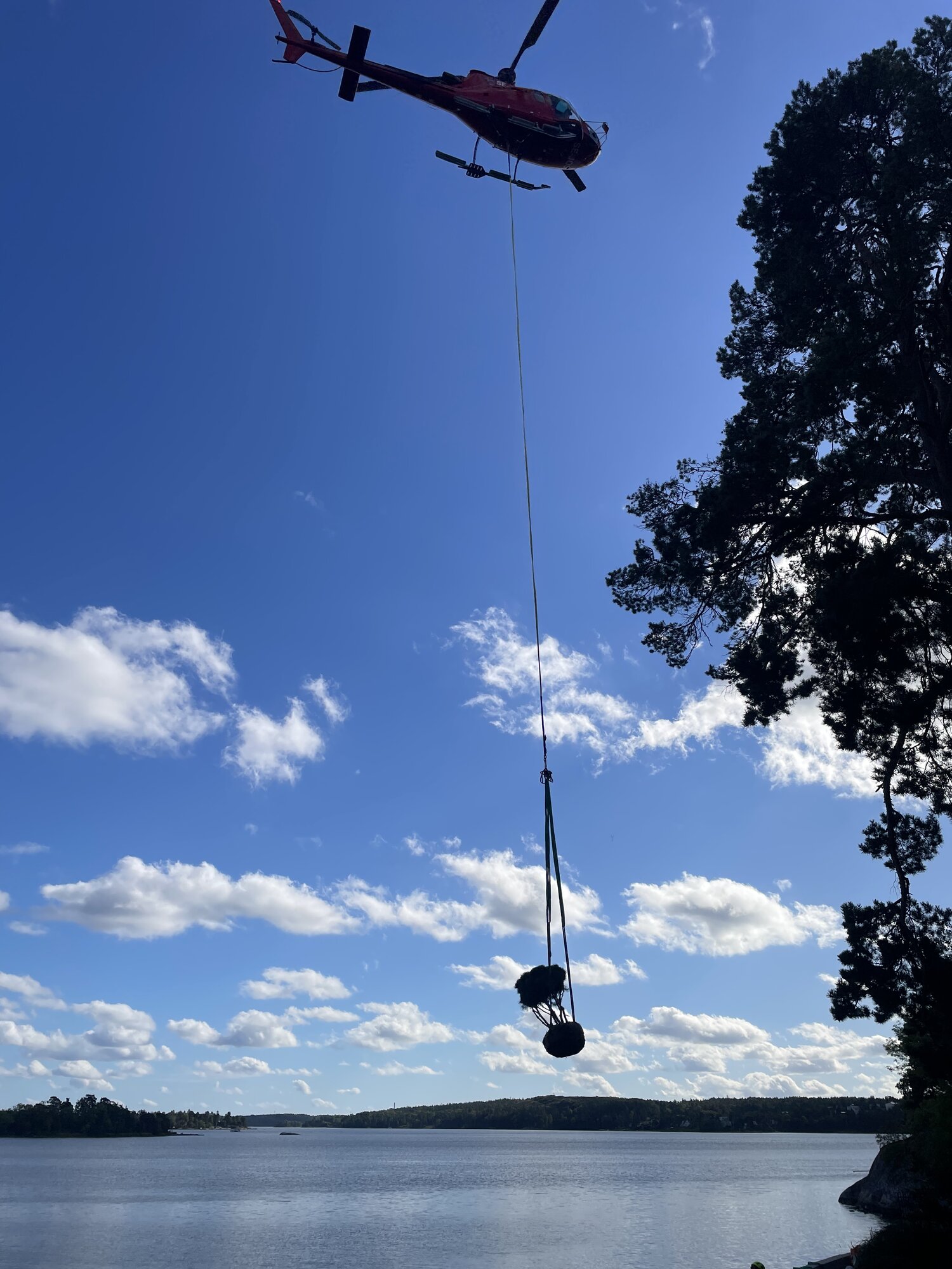 Helicopter with external load at a construction project