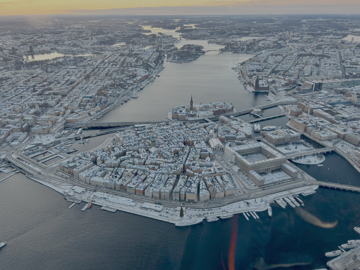 Gamla Stan in Stockholm covered in snow, seen from a helicopter in winter light