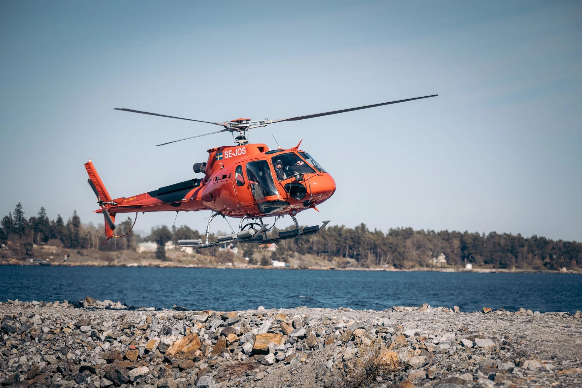 Arlanda AS350 helicopter in flight over Stockholm
